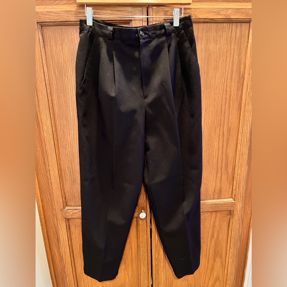 Black trousers pleated